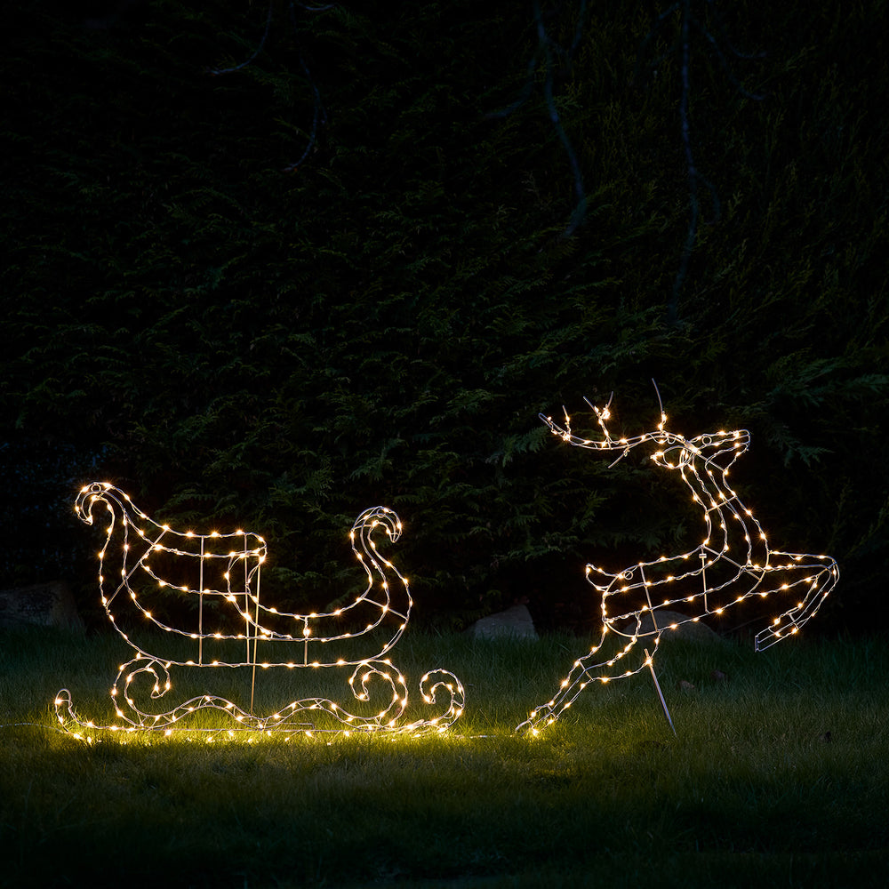 Weihnachts-Silhouette Bicolor LED Rentier mit Schlitten warmweiß