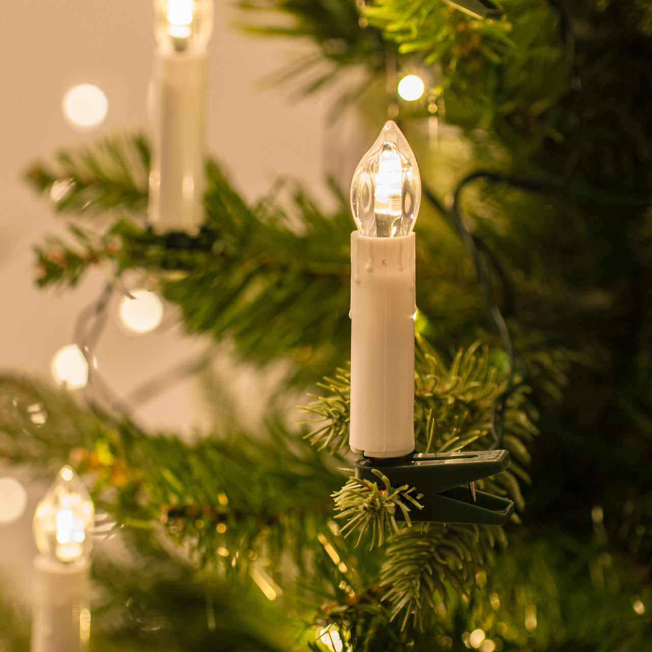 https://www.lights4fun.de/cdn/shop/products/CA1450CLIP-IV-EURO_50-LED-Christmas-Tree-Clip-Candles-On-Fake-Tree_P2.jpg?v=1669983761&width=1280